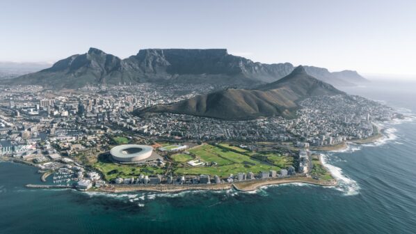 aerial view of city near mountain during daytime