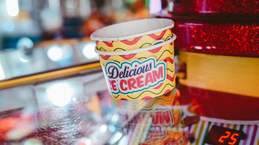 a cup of ice cream sitting on top of a counter